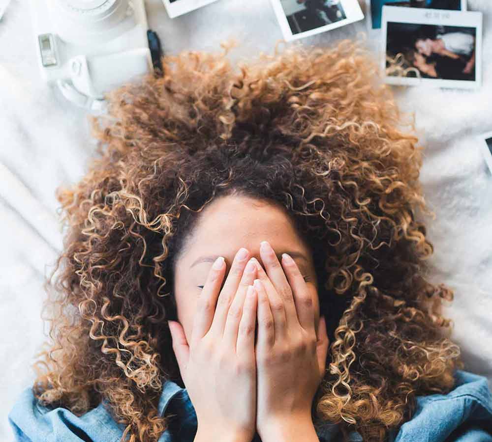 Girl Holding Her Hands Over Her Face Girl Holding Her Hands Over Her Face